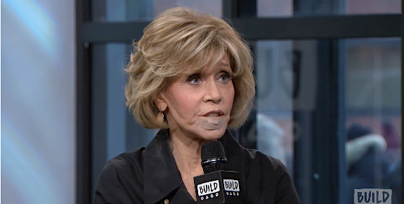 Jane Fonda quickly explained the bandage on her lip.