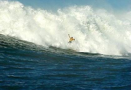 <p>Kelly Slater hanging on in the whitewash at Maverick’s. </p>