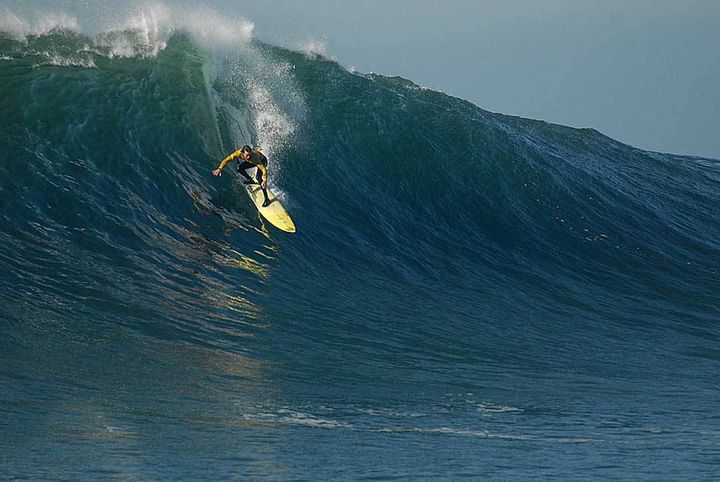 <p>Grant “Twiggy” Baker with the steep drop at Maverick’s.</p>