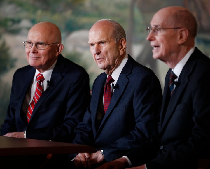 Russell M. Nelson (center), First Counselor Dallin H. Oaks (left), and Second Counselor Henry B. Eyring (right) answer press questions after Nelson was announced as the 17th president of the Mormon Church.