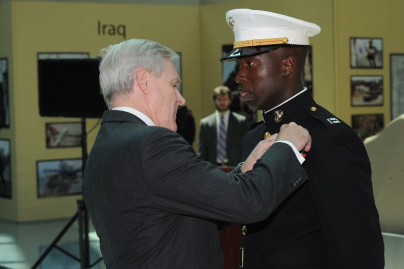 <em>Capt. Ademola Fabayo receiving the Navy Cross. )</em>