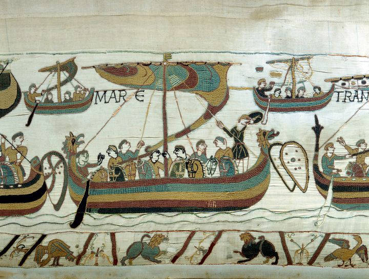 A scene from the 70m long tapestry shows a fleet sailing towards England