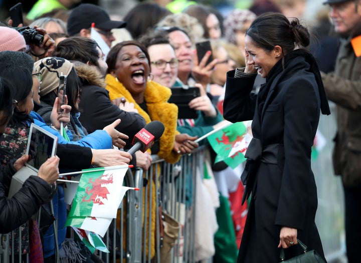 Meghan Markle chats with fans during her visit to Cardiff Castle.