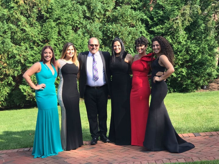 Amer Adi Othman, third from left, and his wife, Fidaa Musleh, third from right, are seen with their daughters, Lina, Lana, Rania and Haneen Adi, in an undated photo.