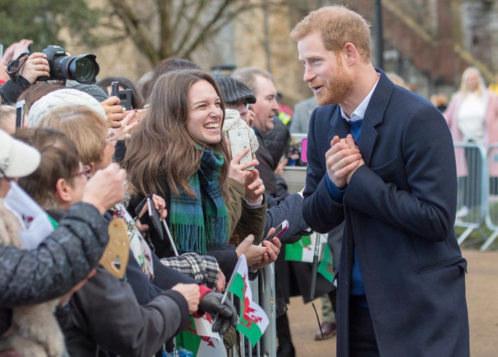 Prince Harry works the crowd.