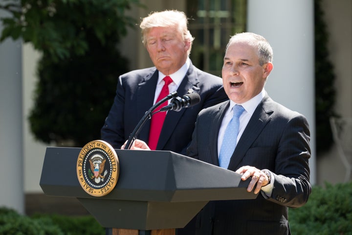 Pruitt and President Donald Trump in June 2016 as they announce plans to withdraw from the Paris climate accord.