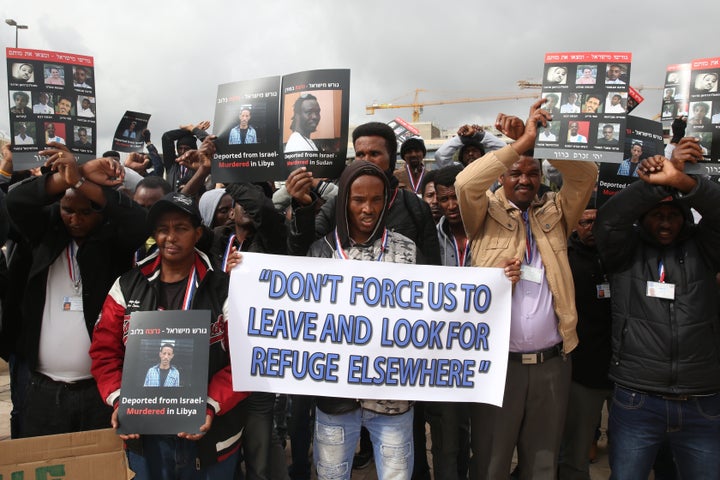 African asylum-seekers, mostly from Eritrea, protest Israel's deportation policy in front of the Supreme Court in Jerusalem o