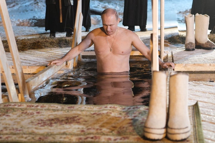 Vladimir Putin Strips For Ice Cold Dip During Religious Ceremony