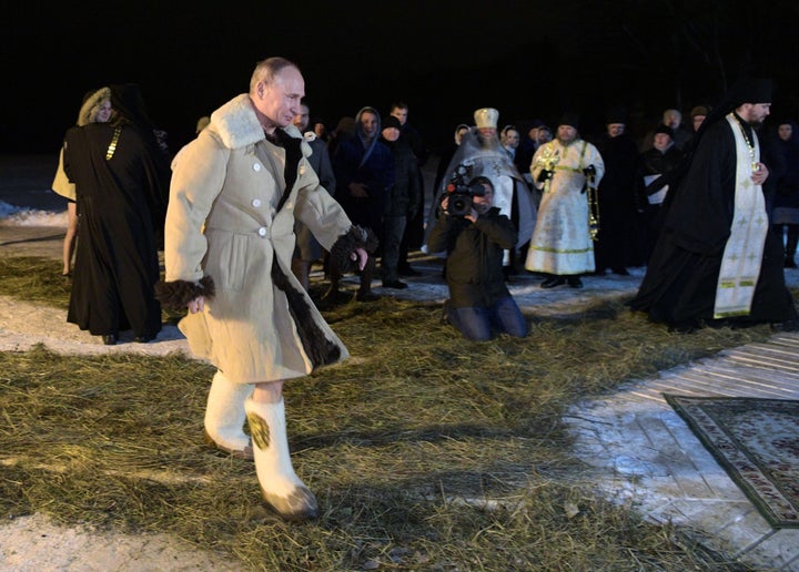 Vladimir Putin Strips For Ice Cold Dip During Religious Ceremony