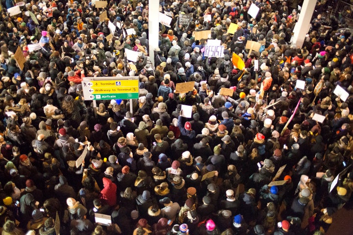 After U.S. President Donald Trump issued a travel ban on seven Muslim-majority countries, leaving travelers with visas to the U.S. in limbo at JFK airport, protesters gathered to demand they be released. 