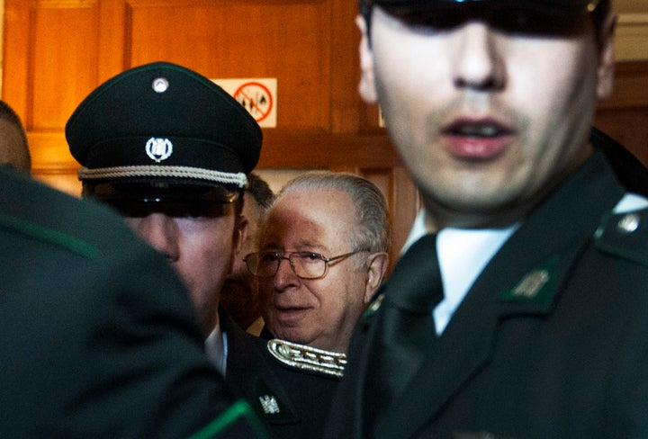 Chilean priest Fernando Karadima leaves a courtroom in Santiago, Chile, on Nov. 11, 2015.