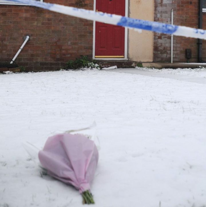 A floral tribute left at the crime scene