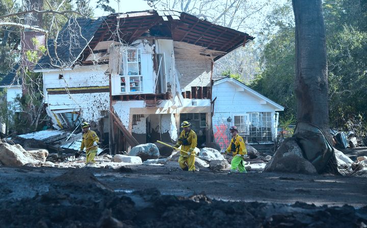Search and rescue team workers outside a demolished property in Montecito, California, on Jan. 12.