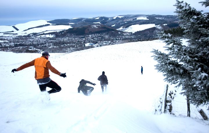 Cross-country runners set off through heavy snow around Peebles in the Scottish Borders.