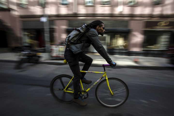 <strong>A bike messenger rides through New York. </strong>