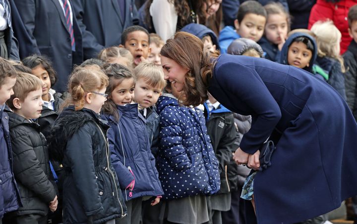The Duchess of Cambridge greets children at Reach Academy Feltham in London, a school working in partnership with Place2Be.