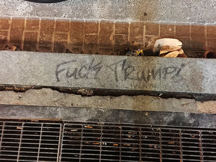 The tag on the curb outside Ben's Chili Bowl on Washington's U St. is Dirty Knucklez favorite of the multitude he's plastered