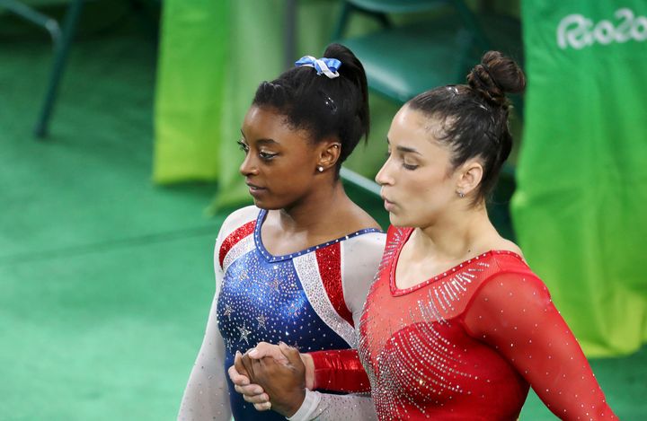 American gymnasts Simone Biles (L) and Aly Raisman (R) during the 2016 Rio Olympics.