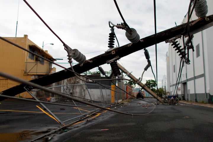 A power line in San Juan months after it was downed by Hurricane Maria. 