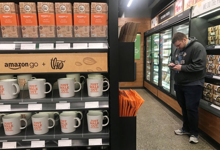 A shopper in the line-free Amazon Go store in Seattle.