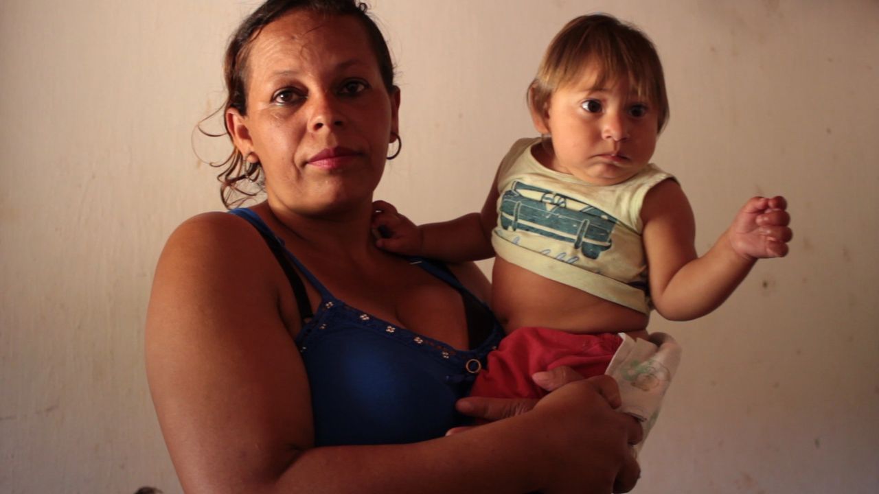 Rosângela Ferreira de Barros holds her son Miguel, who was born with congenital Zika syndrome. 