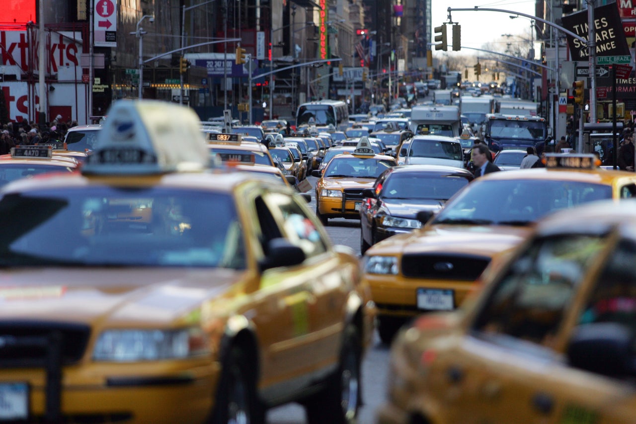 Traffic makes its way through Times Square in New York City.