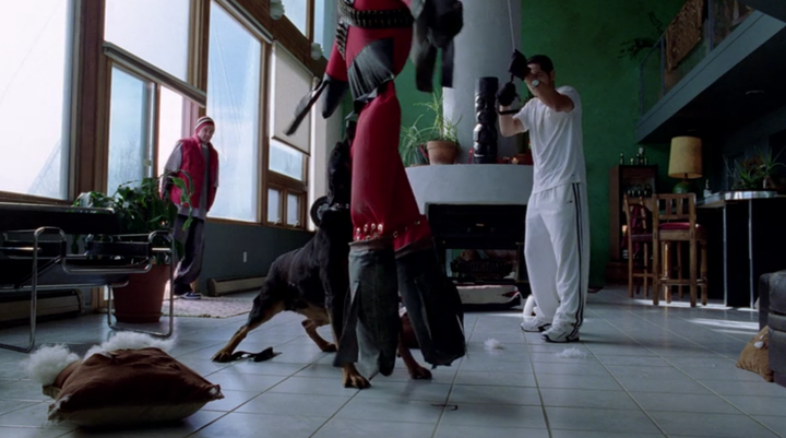 Jesse (Aaron Paul) pays Krazy-8 (Max Arciniega) and his attack dog a visit.