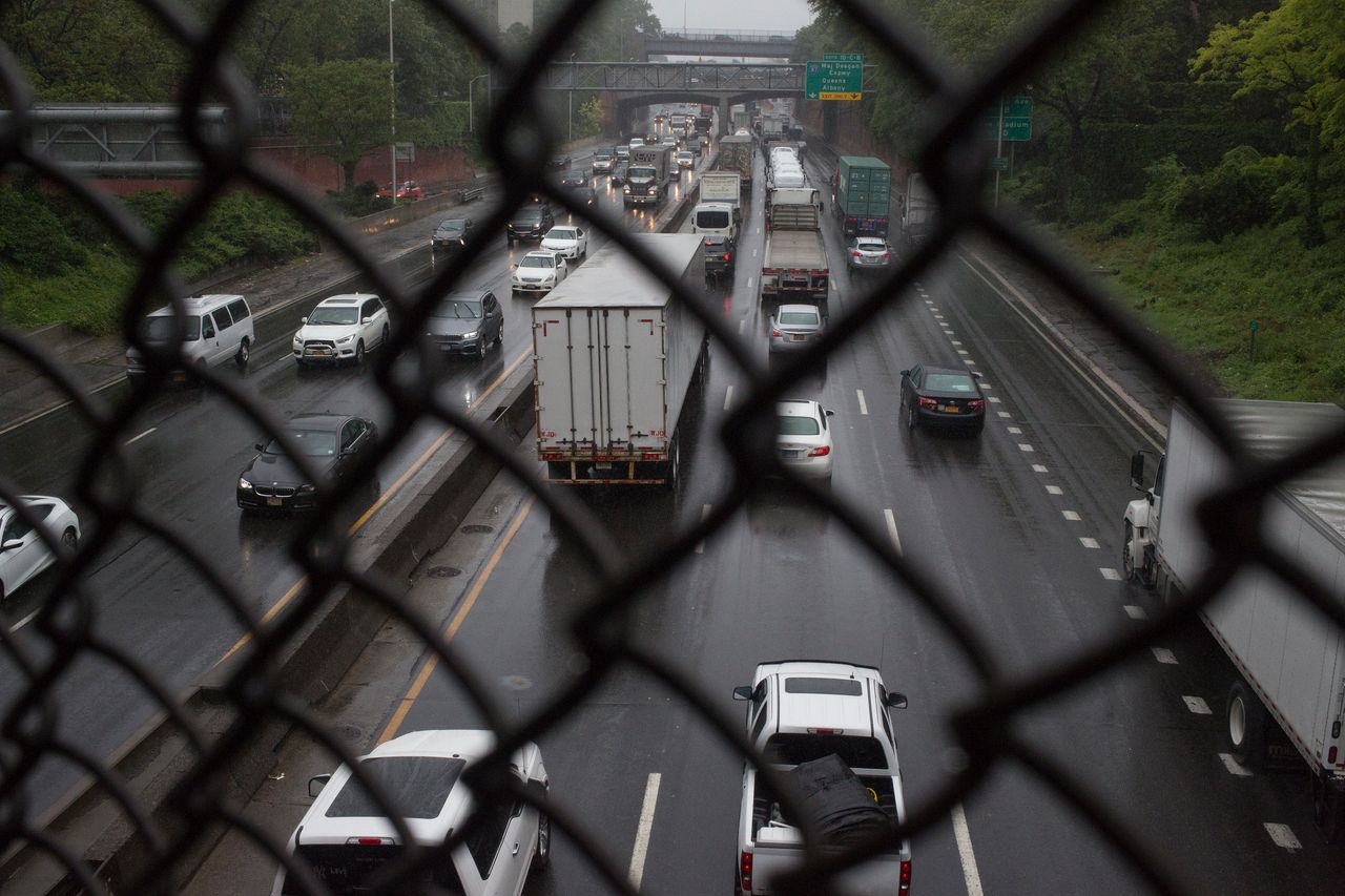 Trucks and cars drive on the Cross Bronx Expressway, one of the busiest highways in the U.S.