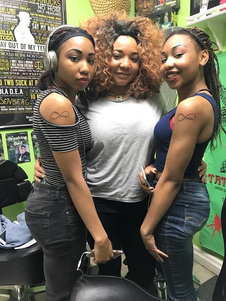Syreeta Steward, center, is pictured with twin daughters Zhane (left) and Jholie Moussa. Jholie has been missing for nearly t