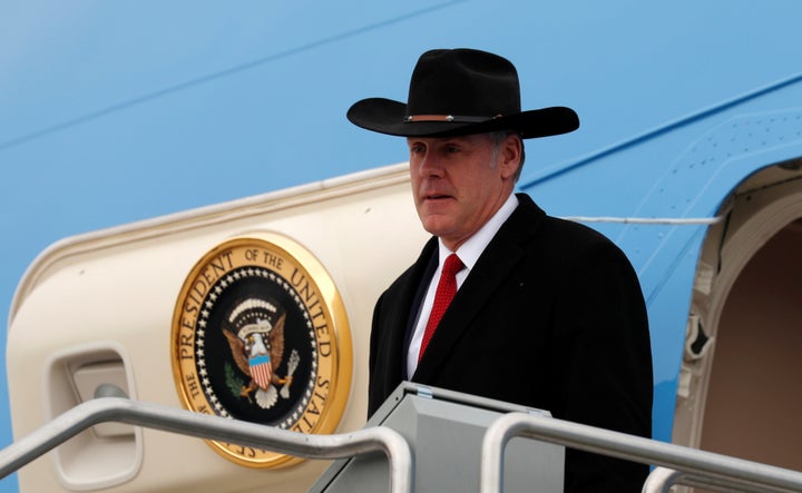 Interior Secretary Ryan Zinke steps from Air Force One as President Donald Trump arrives in Salt Lake City, Utah, on Dec. 4, 2017.