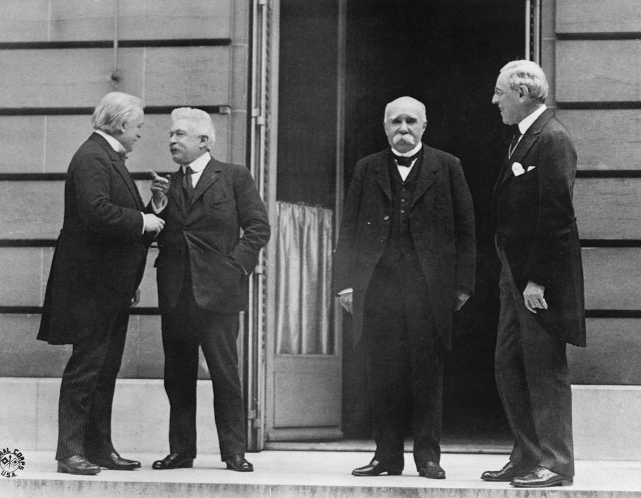 Prime Minister Lloyd George of Great Britain, Prime Minister Orlando of Italy, Premier Clemenceau of France, and President Wilson of the United States meet at the Hotel Crillon in Paris as part of the peace conference
