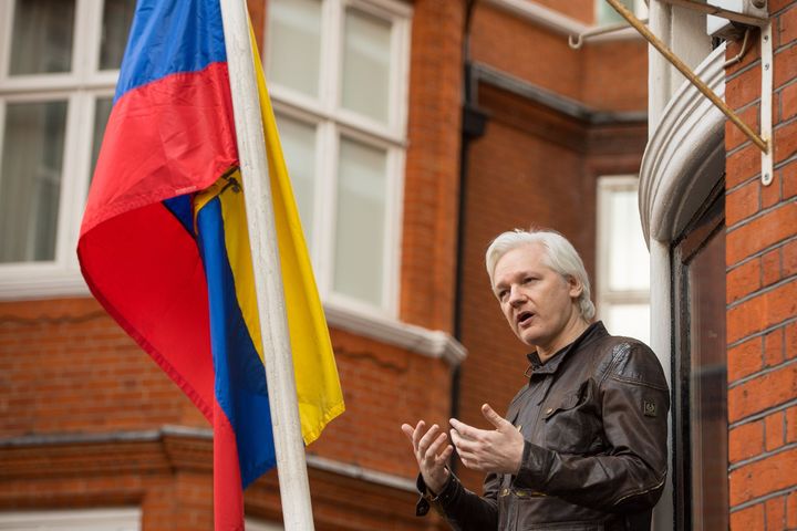 Julian Assange seen speaking from the balcony of the Ecuadorian embassy in London