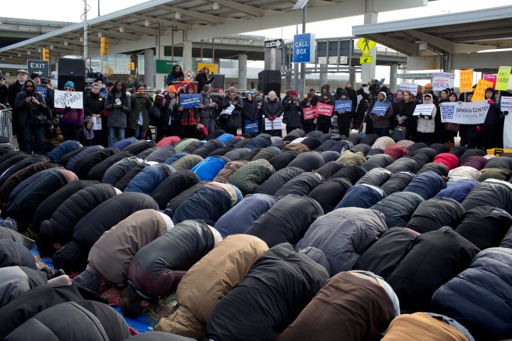 The New York Immigrant Coalition protests President Donald Trump's executive order to ban immigration from seven muslim count