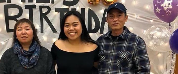 Emily Huynh stands with her parents, Cindy and Minh. Her father, Minh, applied for a delivery job only to receive an insulting message that read, in part, "If you no speak English."