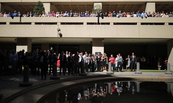 FBI agents and employees stand with their hands over their hearts for the national anthem at September's installation ceremonies for the agency's incoming director, Christopher Wray, in Washington.