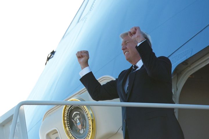 President Donald Trump steps off Air Force One upon arrival for an appearance in Greer, South Carolina, on Oct. 16, 2017.