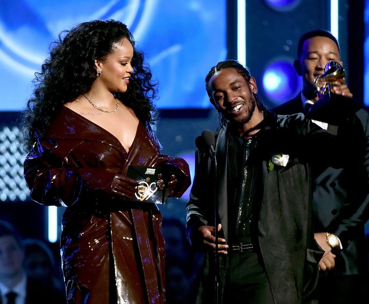 Rihanna wore a shiny trench coat at the Grammys.