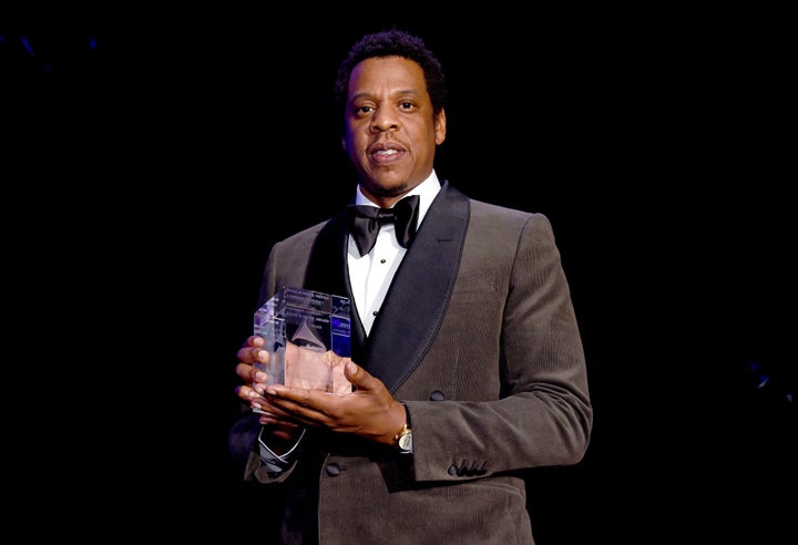 Jay-Z accepts the President's Merit Award during the Clive Davis and Recording Academy Pre-Grammy Gala on Saturday. 