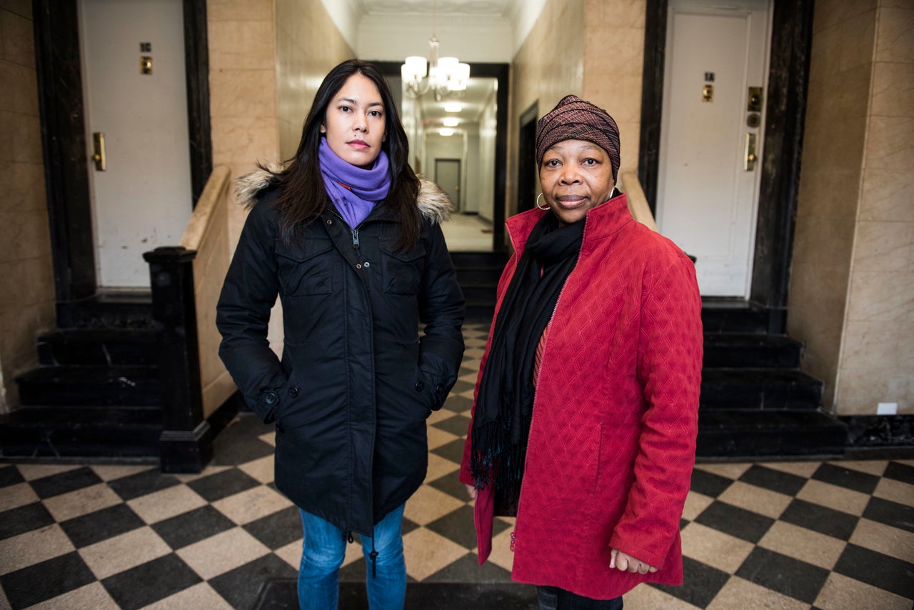 Dara Soukamneuth and Clentine Fenner inside the lobby of their apartment building in Crown Heights, Brooklyn, on Jan. 13, 2018. The two women are members of the building's tenant union, which advocates for safe and healthy living conditions.