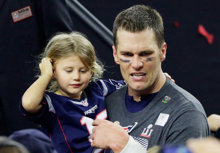 Vivian and dad after the Patriots' Super Bowl victory last year.