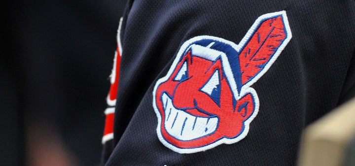 The controversial Chief Wahoo logo is seen on the sleeve of a Cleveland Indians player during a game in 2016.