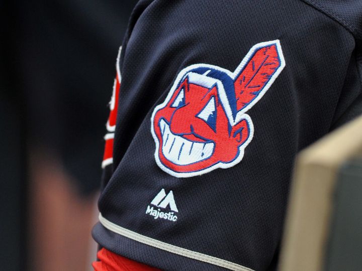 The controversial Chief Wahoo logo is seen on the sleeve of a Cleveland Indians player during a game in 2016.