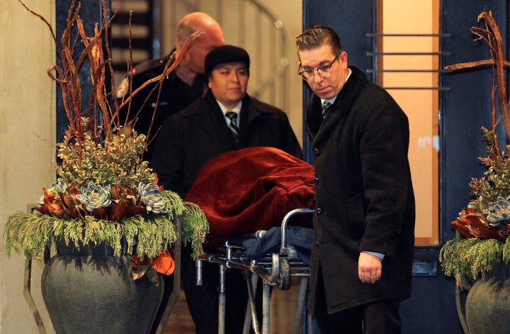 One of two bodies is removed from the home of billionaire founder of Canadian pharmaceutical firm Apotex Inc.