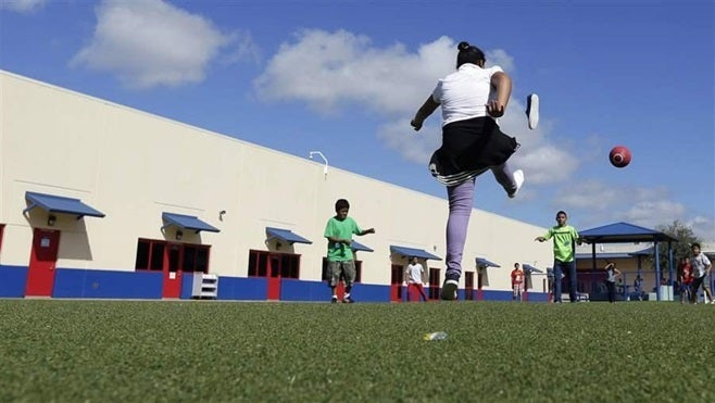 Children play in a Texas residential center for women and children detained at the Mexican border. The number of children fou