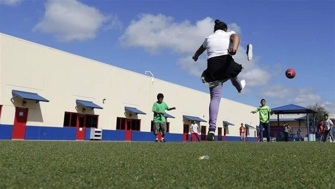 Children play in a Texas residential center for women and children detained at the Mexican border. The number of children found at the border has increased sharply since April, after a drop early in the Trump administration.