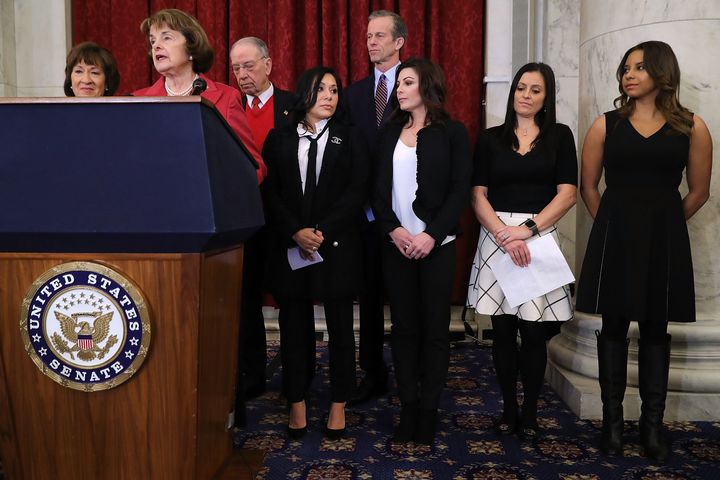 (L-R) Sen. Susan Collins (R-Me.), Sen. Dianne Feinstein (D-Calif.), Senate Judiciary Committee Chairman Charles Grassley and Sen. John Thune (R-SD) join former champion gymnasts Jeanette Antolin, Dominique Moceanu, Jamie Dantzscher and Mattie Larson for a news conference on January 30, 2018 in Washington, DC. 