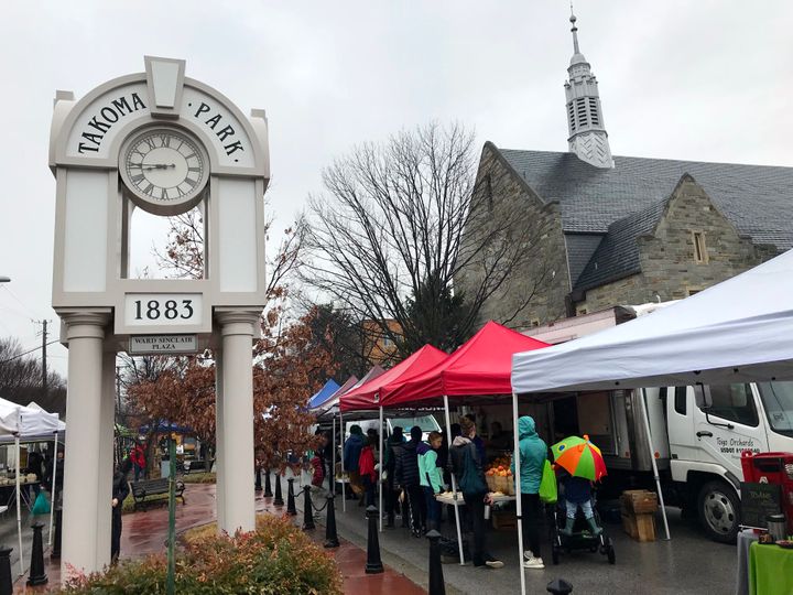 Takoma Park residents check out mushrooms, locally made cheese and 10 varieties of apples at the weekly farmer's market.