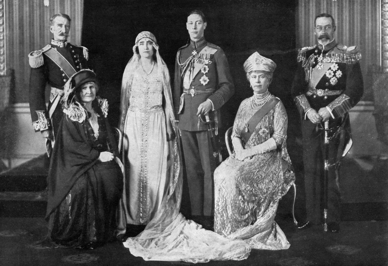 Elizabeth Bowes-Lyon and Prince Albert (centre) on their wedding day, with their parents the Earl and Countess of Strathmore (left) and King George VI and Queen Mary 