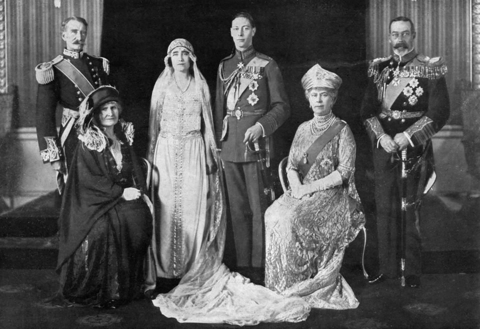 Elizabeth Bowes-Lyon and Prince Albert (centre) on their wedding day, with their parents the Earl and Countess of Strathmore (left) and King George VI and Queen Mary 