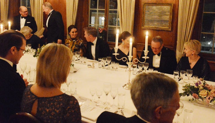 Catherine, Duchess of Cambridge is seated next to the British ambassador to Sweden, David Cairns, during dinner at the ambassador's residence in Stockholm on Jan. 30.